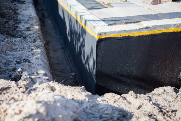 Professional Wet Basement Repair technician working in Norwood, OH
